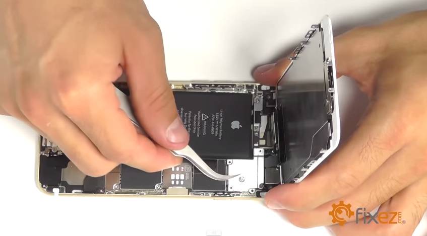 fix cracked iphone screen step 3 Use your curved tweezers to pry the metal plate