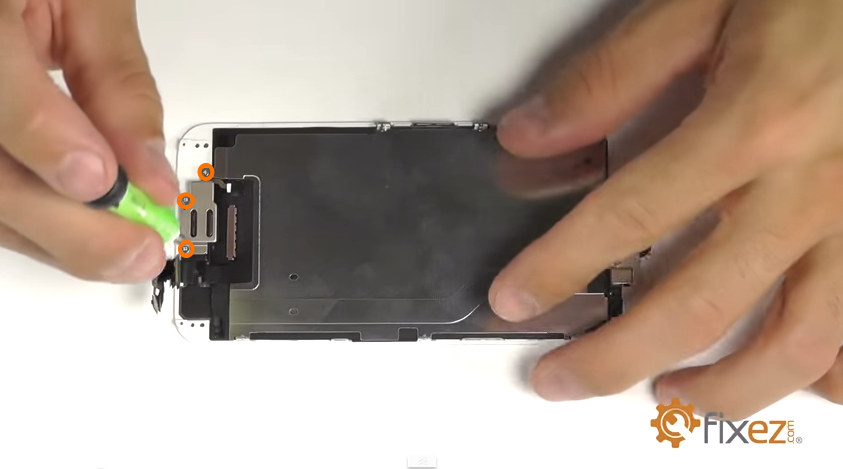 fix cracked iphone screen step 6 Unscrew the bracket holding the earpiece